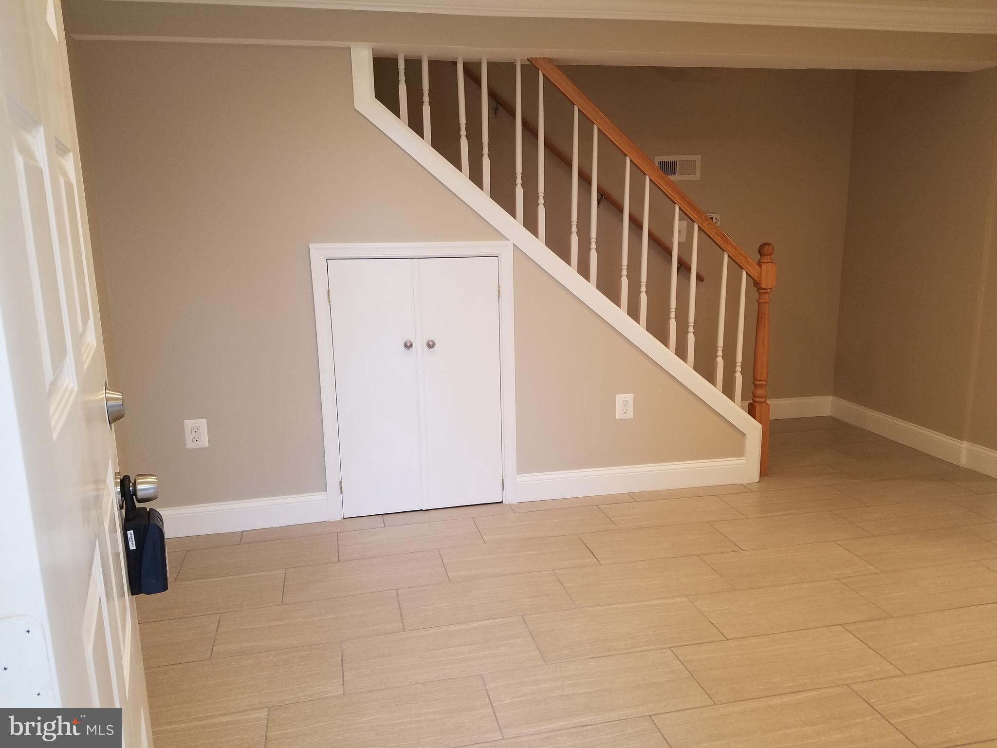 12919 Neola Road Silver Spring, MD 20906 - Photo 2 of 29 Stairs on first floor leading to the main level
