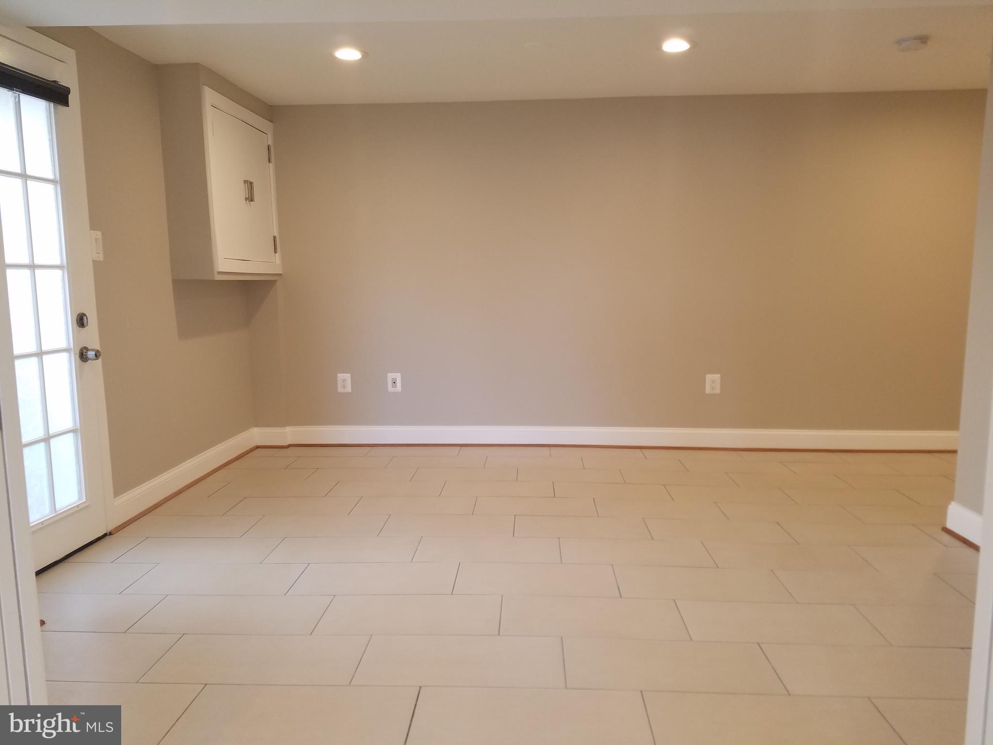12919 Neola Road Silver Spring, MD 20906 - Photo 19 of 29 Living room view on lower level