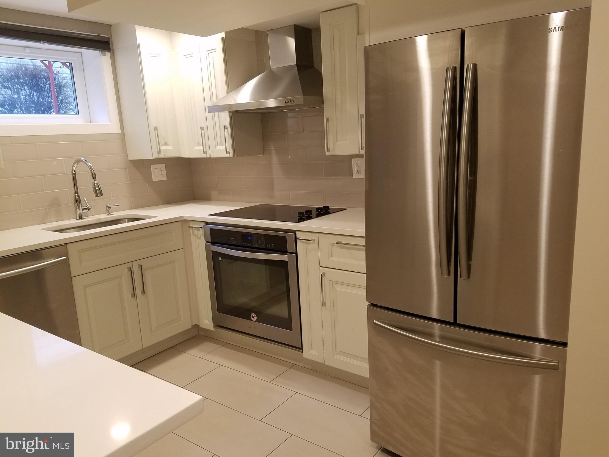12919 Neola Road Silver Spring, MD 20906 - Photo 20 of 29 Lower level kitchen