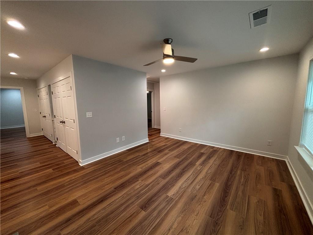 1389 Lanvale Drive Southwest Atlanta, GA 30310 - Photo 4 of 27 wooden floor in an empty room with a window