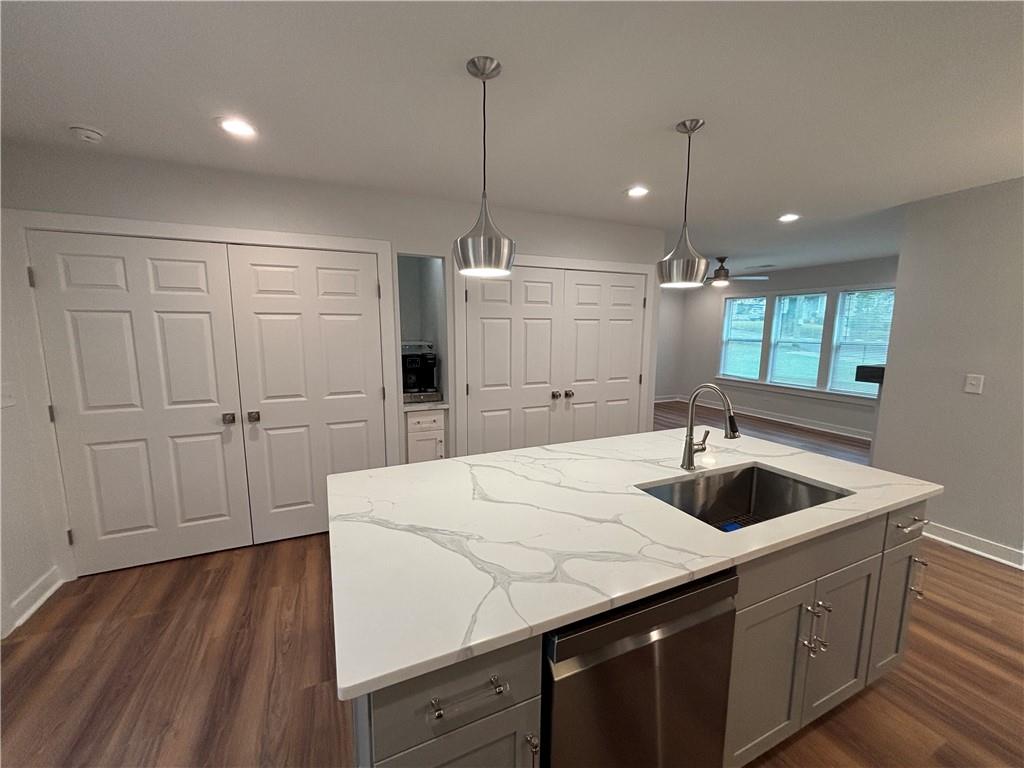1389 Lanvale Drive Southwest Atlanta, GA 30310 - Photo 8 of 27 a kitchen with a sink a counter space and a refrigerator