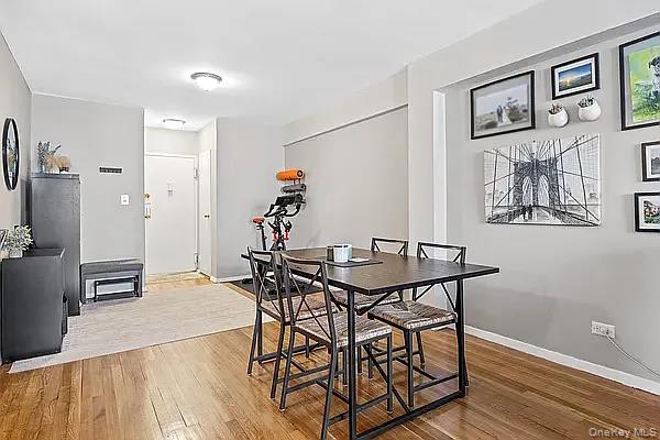 800 Grand Bronx, NY 10451 - Photo 6 of 10 a view of a dining room with furniture and wooden floor