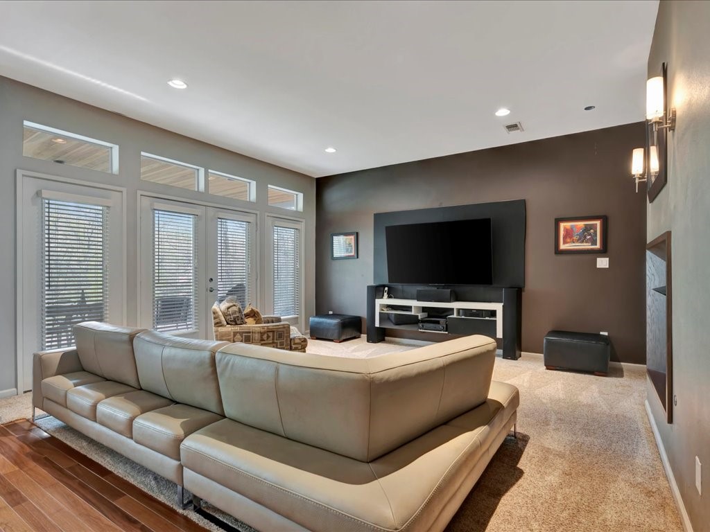 3418 St George Circle Nacogdoches, TX 75965 - Photo 13 of 50 a living room with furniture and a flat screen tv