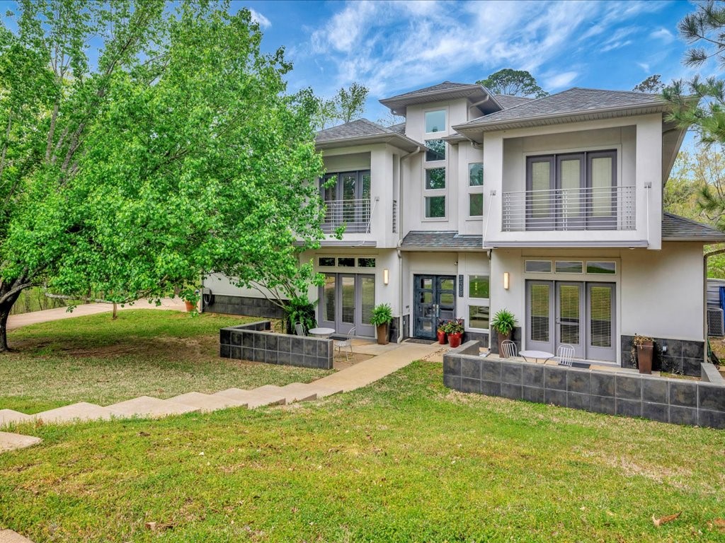 3418 St George Circle Nacogdoches, TX 75965 - Photo 2 of 50 a view of a house with swimming pool and sitting area