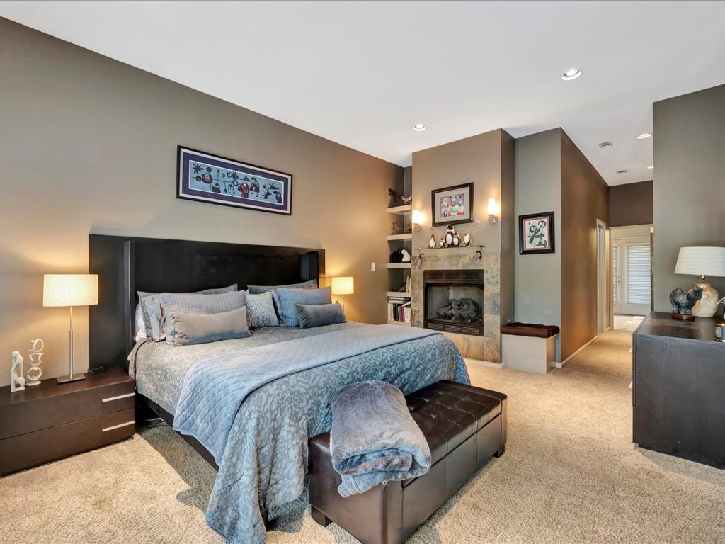 3418 St George Circle Nacogdoches, TX 75965 - Photo 34 of 50 a spacious bedroom with a bed and furniture