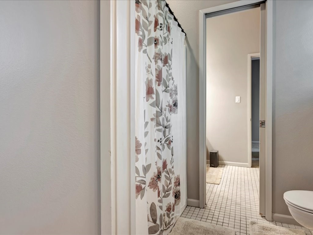 3418 St George Circle Nacogdoches, TX 75965 - Photo 42 of 50 a bathroom with a bathtub and shower