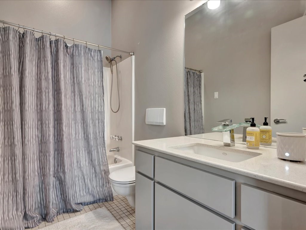 3418 St George Circle Nacogdoches, TX 75965 - Photo 47 of 50 a bathroom with a sink toilet and shower