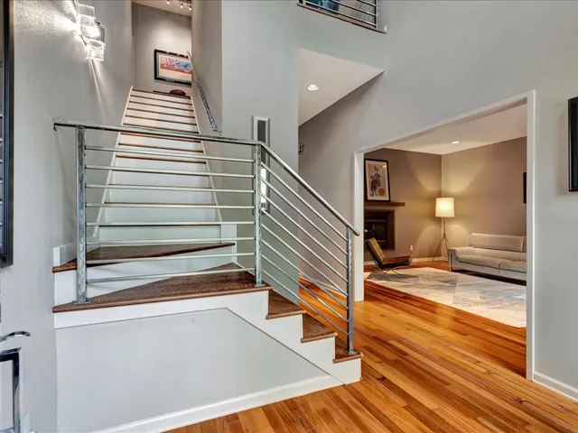 a view of a hallway view with staircase