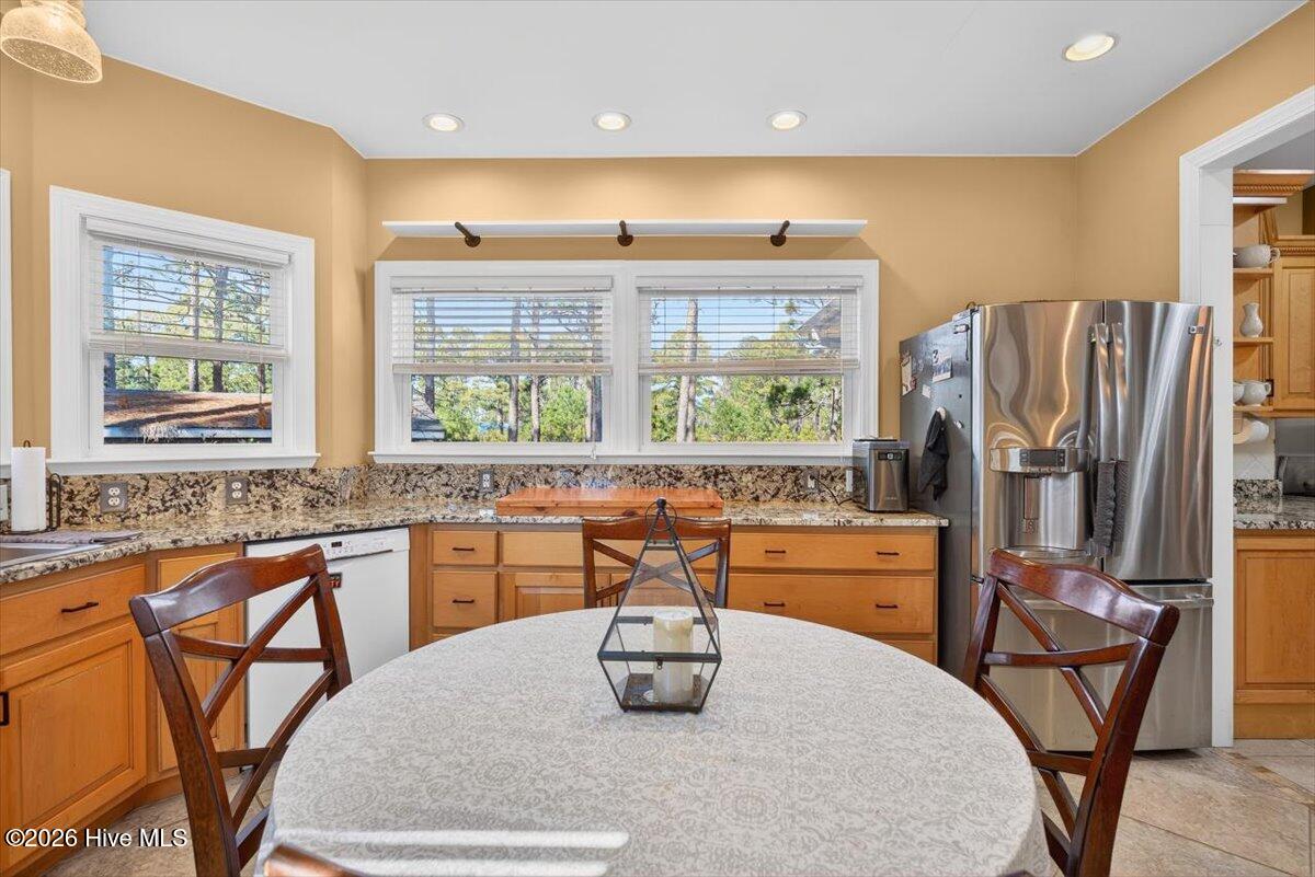 18 Brierwood Road Southwest Shallotte, NC 28470 - Photo 16 of 70 Bright eating area filled with natural light.