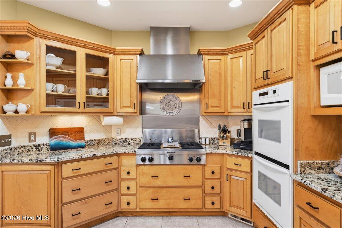 18 Brierwood Road Southwest Shallotte, NC 28470 - Photo 19 of 70 Custom kitchen design with ample storage, quality finishes, and functional layout ideal for entertaining.