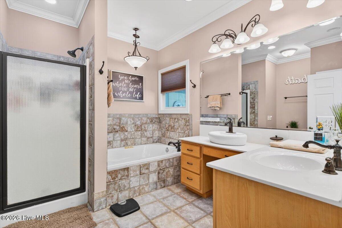 18 Brierwood Road Southwest Shallotte, NC 28470 - Photo 24 of 70 Well-appointed bathroom with walk-in shower, dual vanity, and quality finishes.