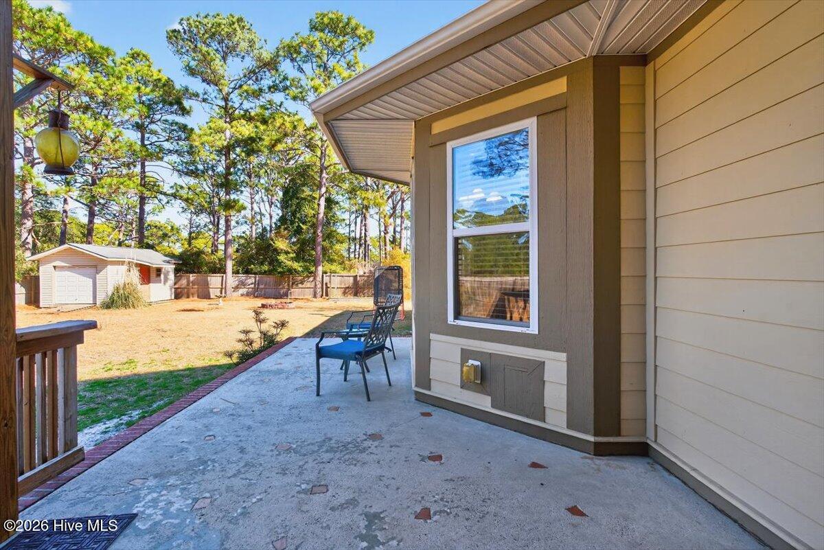 18 Brierwood Road Southwest Shallotte, NC 28470 - Photo 29 of 70 Private outdoor patio space—perfect for grilling, entertaining, or enjoying peaceful backyard views.