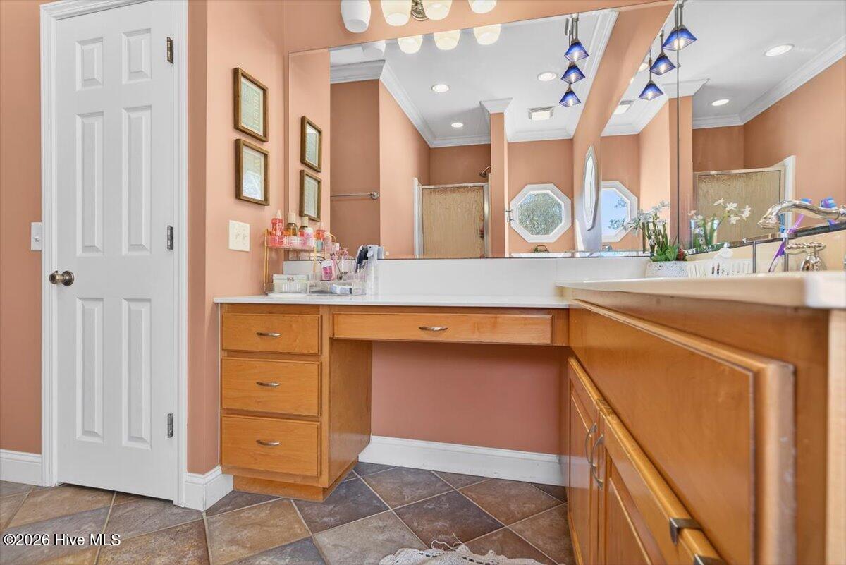 18 Brierwood Road Southwest Shallotte, NC 28470 - Photo 36 of 70 Extended vanity with storage and workspace—ideal for shared use.