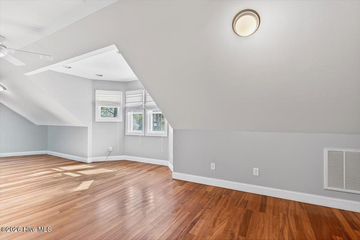 18 Brierwood Road Southwest Shallotte, NC 28470 - Photo 41 of 70 Large upstairs media or game room with vaulted ceilings and flexible layout.
