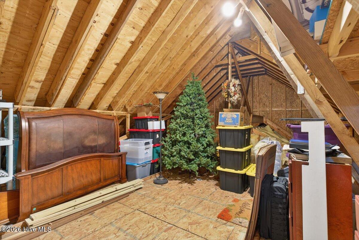 18 Brierwood Road Southwest Shallotte, NC 28470 - Photo 45 of 70 Walk-in attic with ample storage and potential to expand—ideal for adding additional living space.