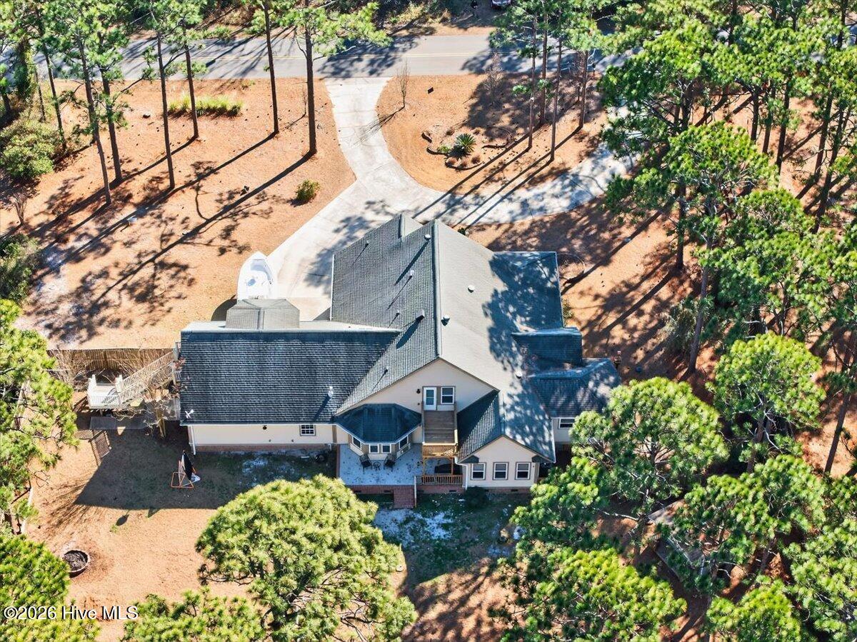 18 Brierwood Road Southwest Shallotte, NC 28470 - Photo 51 of 61 Aerial view of 18 Brierwood surrounded by lush landscaping and trees for added privacy.