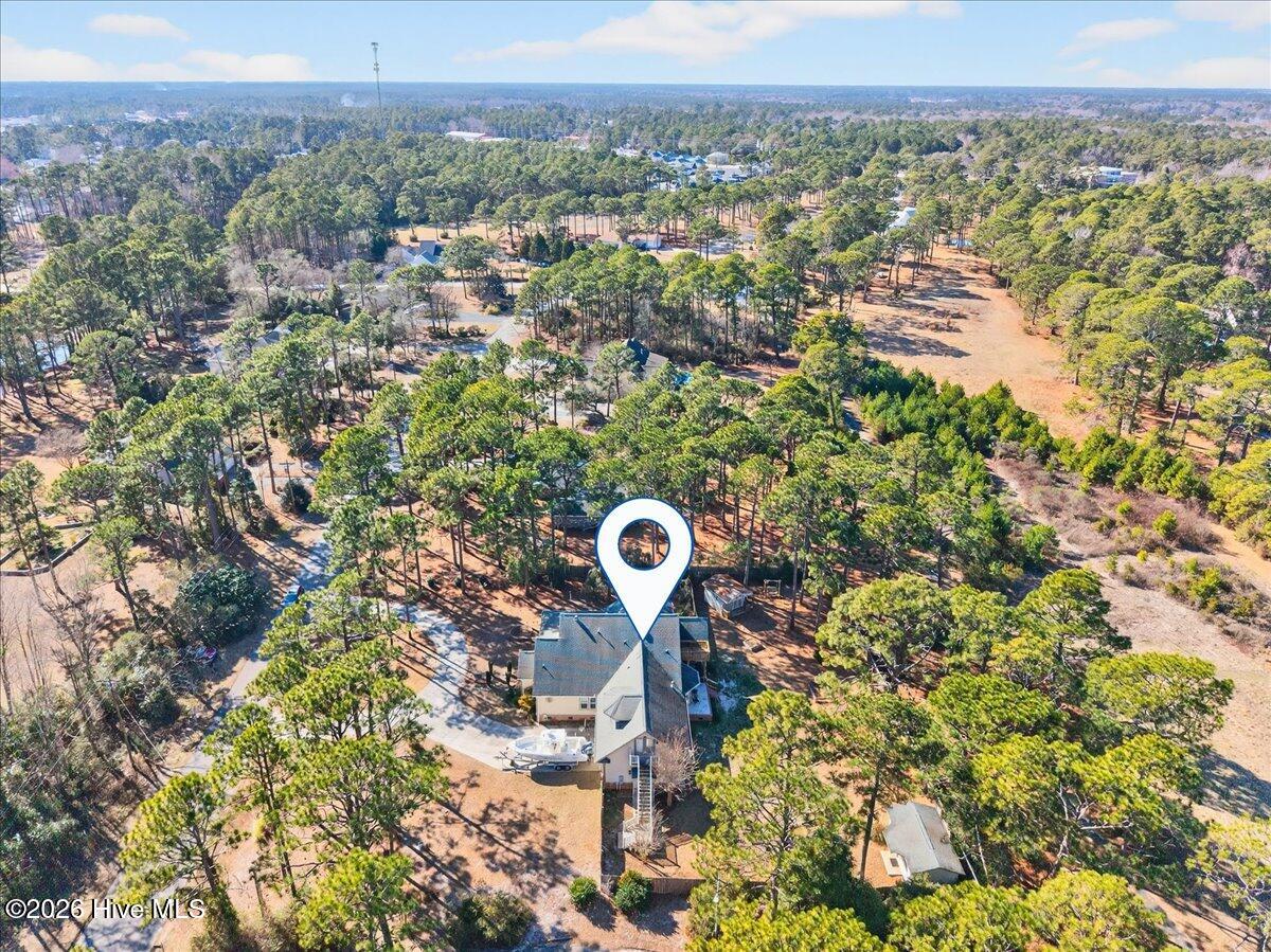 18 Brierwood Road Southwest Shallotte, NC 28470 - Photo 52 of 61 Aerial view of 18 Brierwood surrounded by lush landscaping and trees for added privacy.