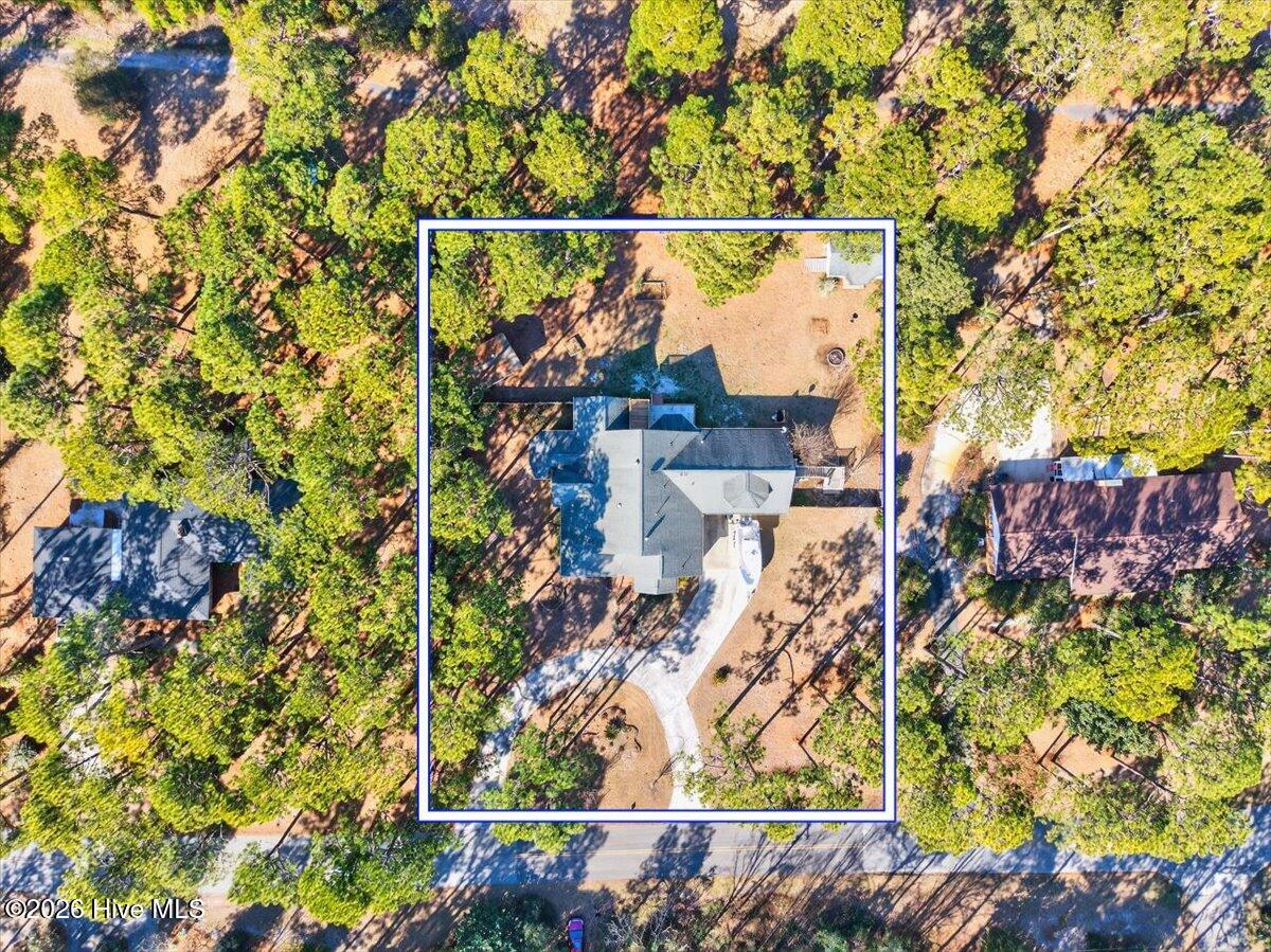 18 Brierwood Road Southwest Shallotte, NC 28470 - Photo 7 of 70 Aerial view showcasing the large private lot, mature landscaping, and peaceful setting in Brierwood Estates.
