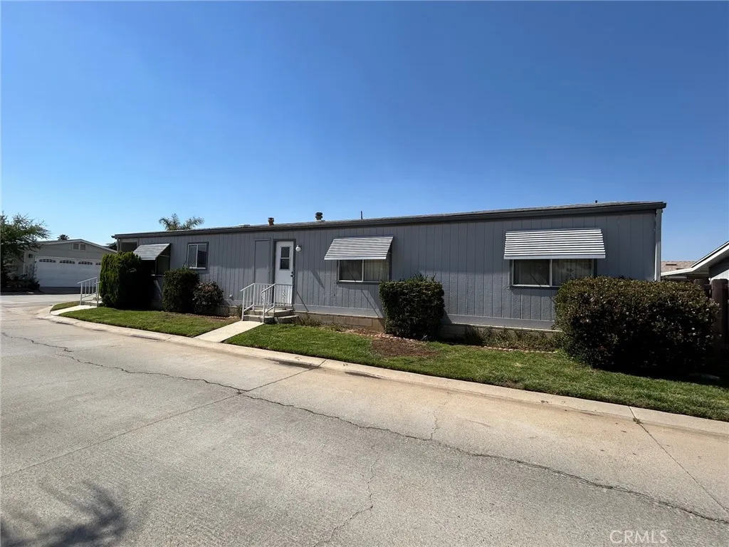 27250 Murrieta Road, Unit 347 Menifee, CA 92586 - Photo 37 of 38 a view of a terrace with a garden