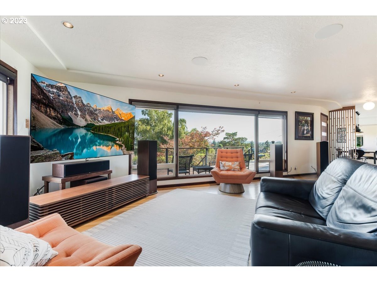 715 Southwest Walters Drive Gresham, OR 97080 - Photo 11 of 48 a living room with furniture and a flat screen tv
