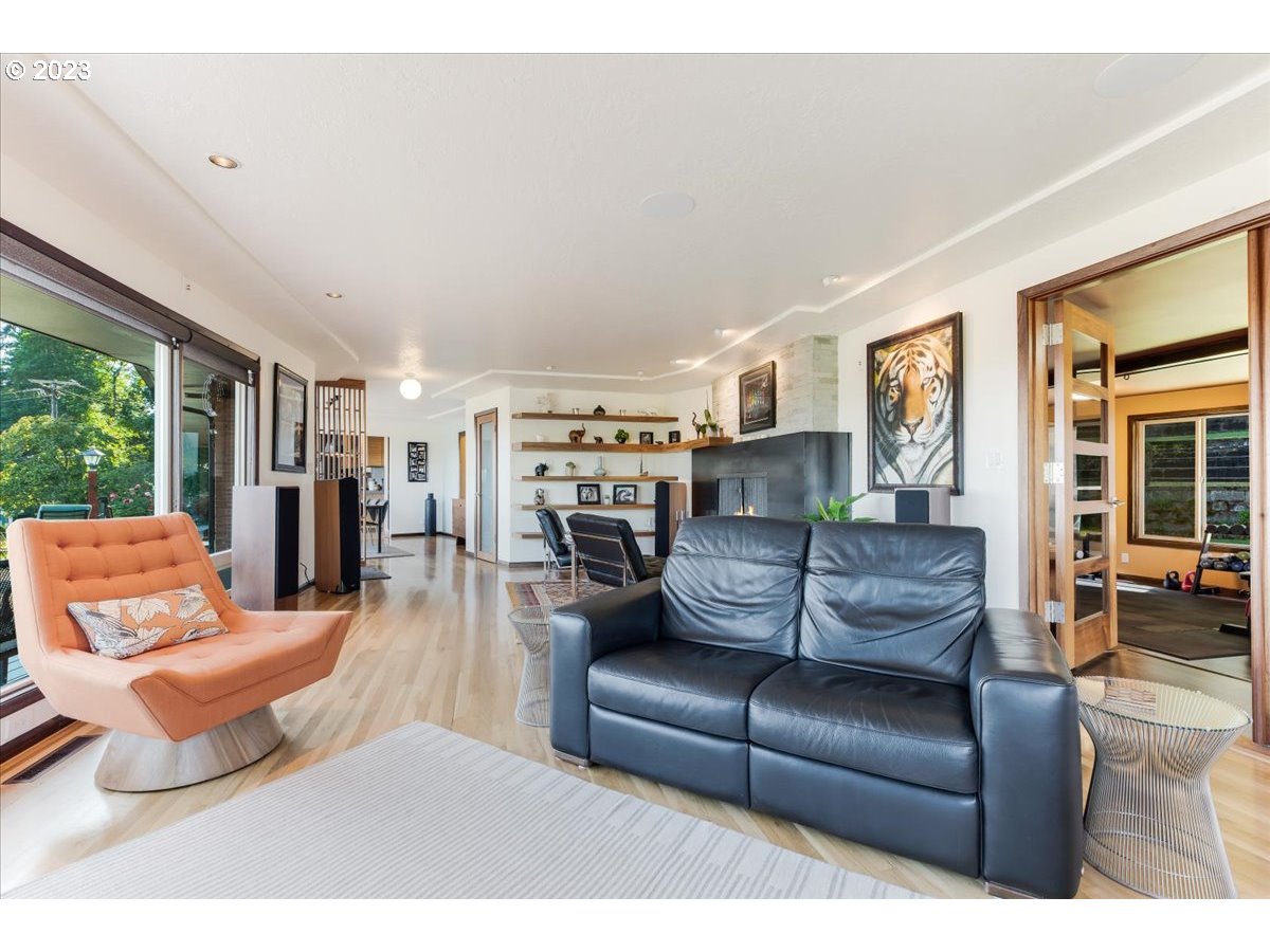 715 Southwest Walters Drive Gresham, OR 97080 - Photo 12 of 48 a living room with furniture and a large window