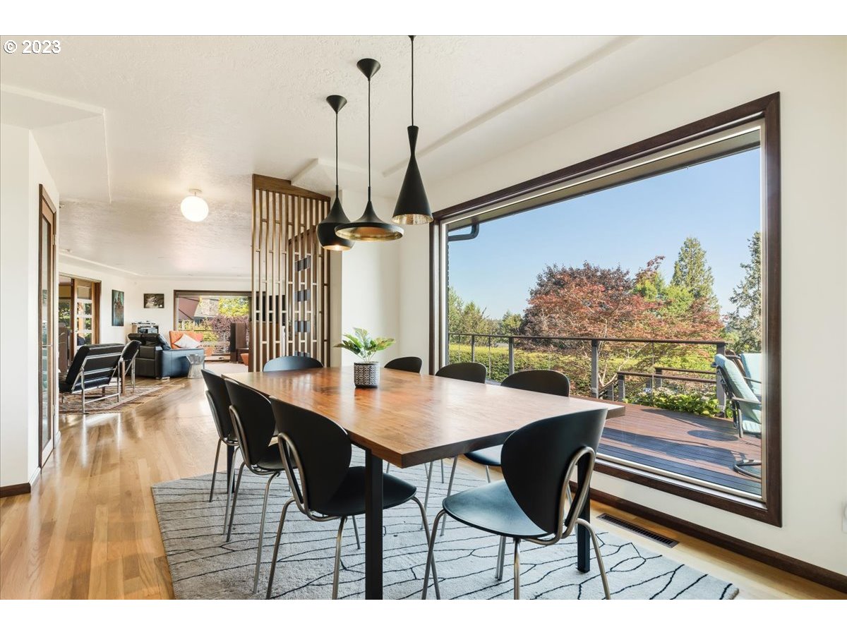 715 Southwest Walters Drive Gresham, OR 97080 - Photo 14 of 48 a view of a dining room with furniture and wooden floor
