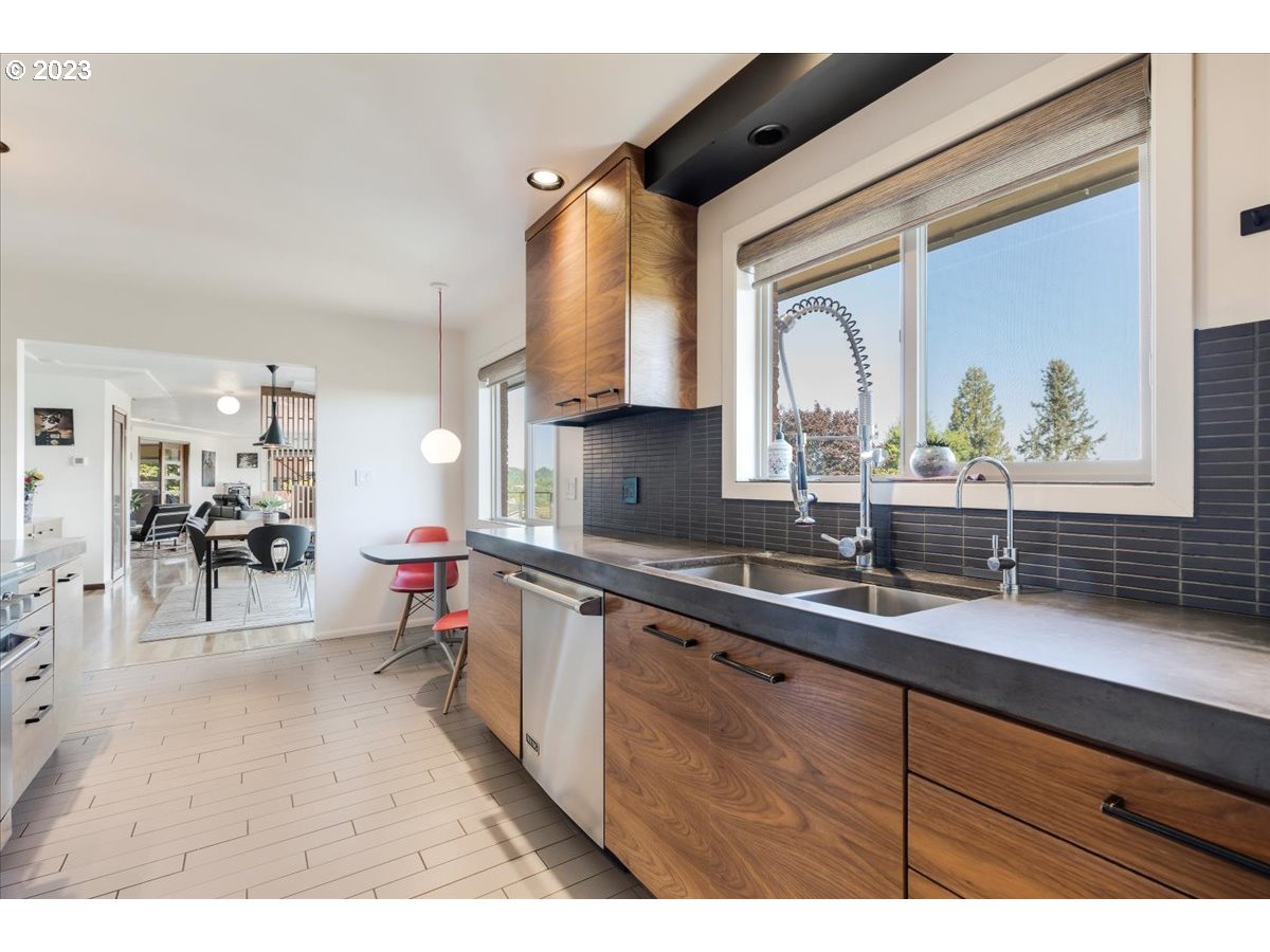 715 Southwest Walters Drive Gresham, OR 97080 - Photo 18 of 48 a kitchen with a sink and cabinets