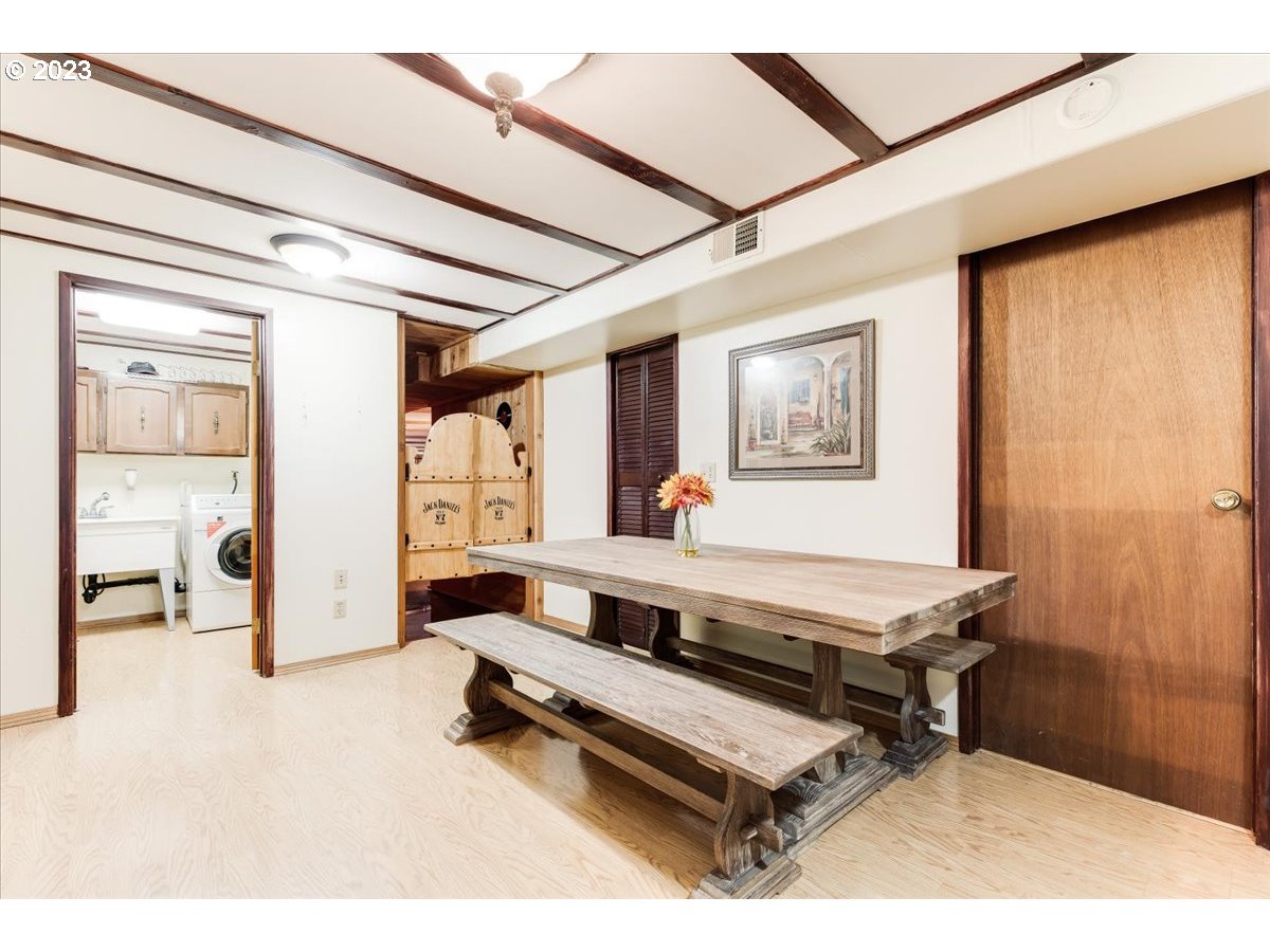 715 Southwest Walters Drive Gresham, OR 97080 - Photo 32 of 48 a living room with furniture a rug and white walls