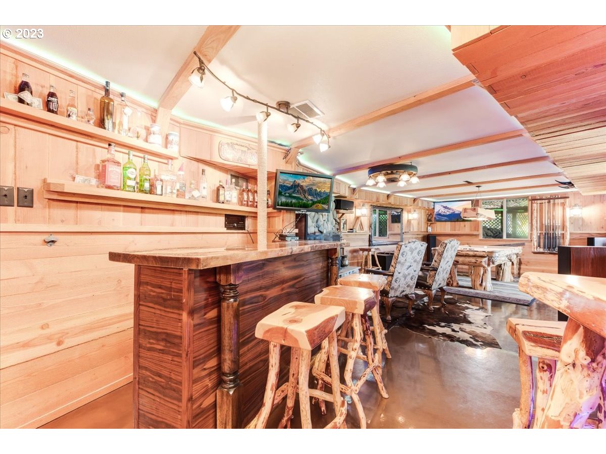 715 Southwest Walters Drive Gresham, OR 97080 - Photo 35 of 48 a living room with lots of furniture and a wooden floor