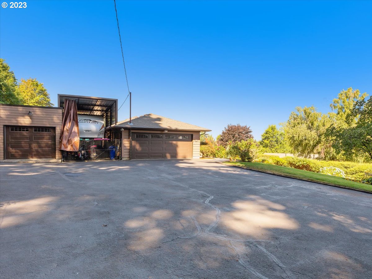 715 Southwest Walters Drive Gresham, OR 97080 - Photo 43 of 48 a view of a house with a road