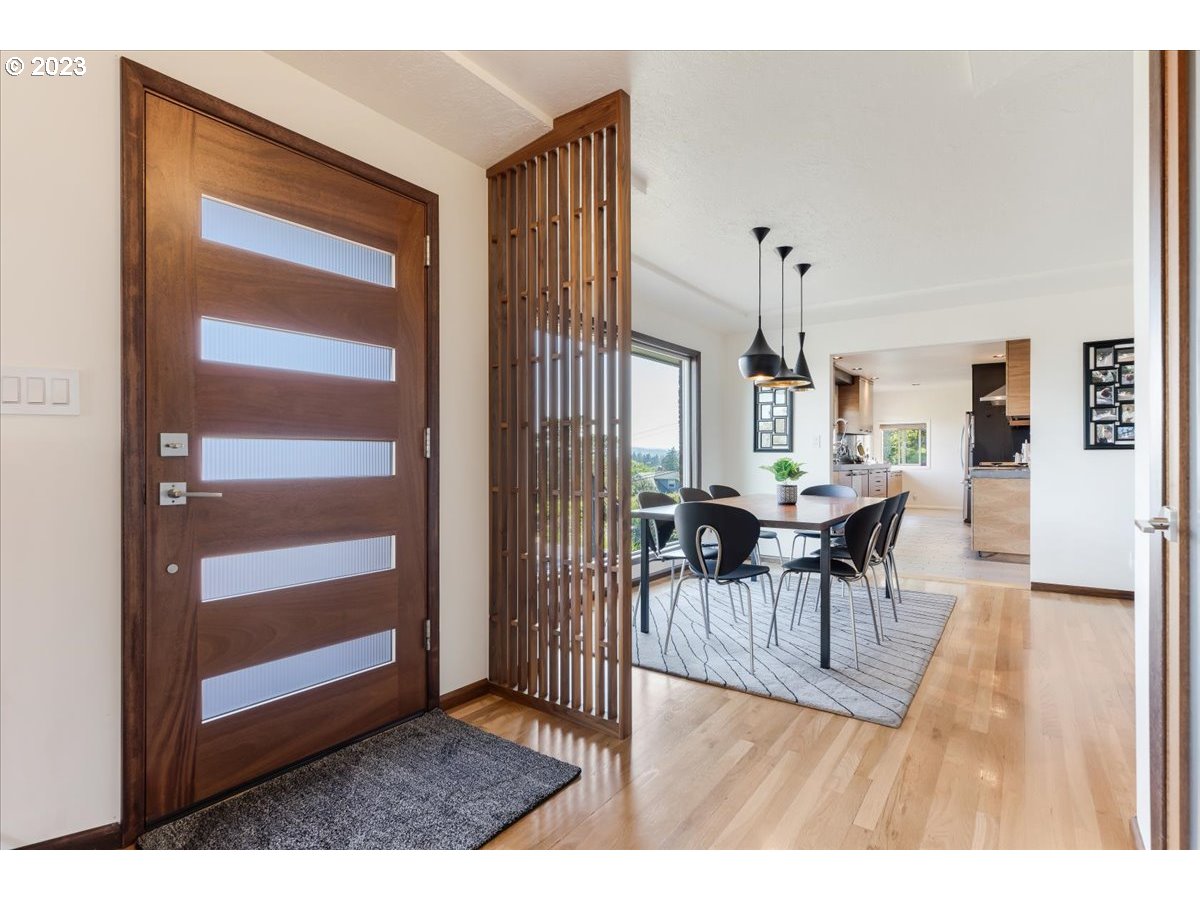 715 Southwest Walters Drive Gresham, OR 97080 - Photo 7 of 48 a dining room with furniture and wooden floor