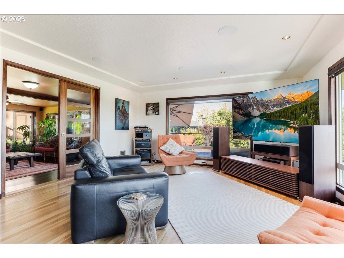 715 Southwest Walters Drive Gresham, OR 97080 - Photo 10 of 48 a living room with furniture and a flat screen tv