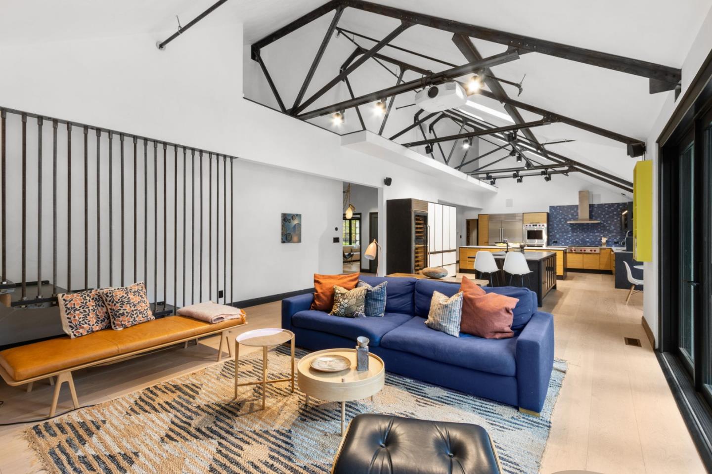 13321 La Paloma Road Los Altos Hills, CA 94022 - Photo 12 of 36 a living room with furniture and a chandelier