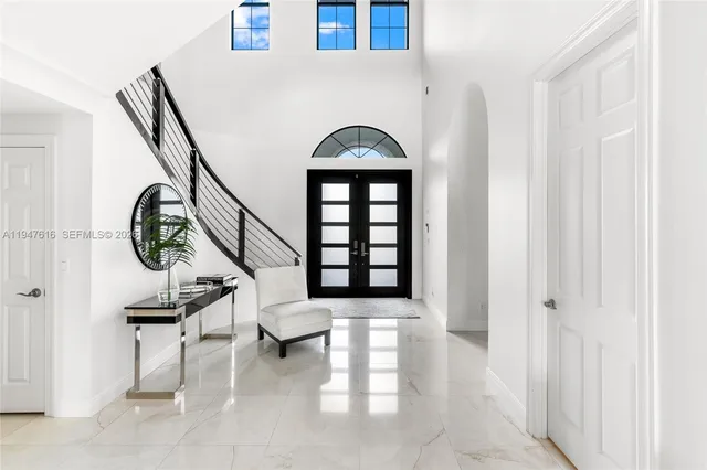 a view of entryway with a front door