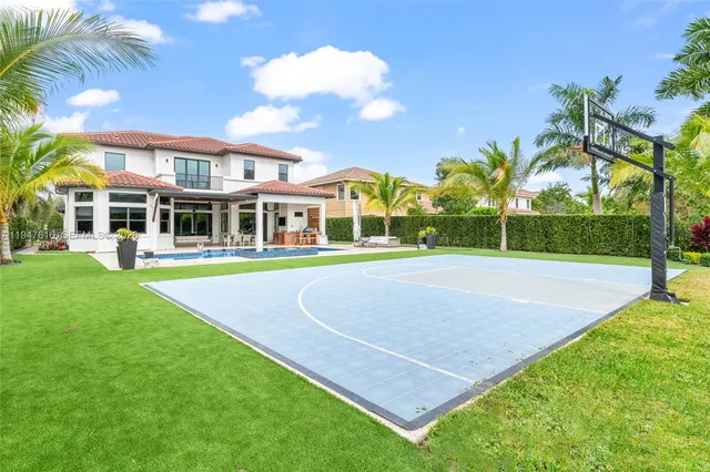 a view of a house with a swimming pool
