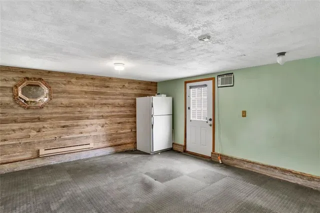 a bathroom with a tub and shower