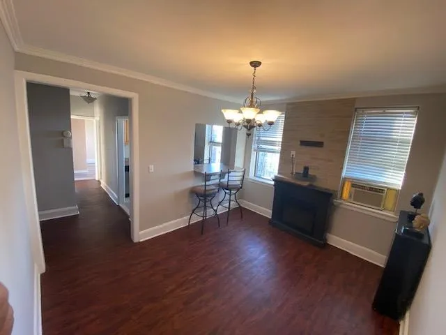 a view of a living room and hardwood floor