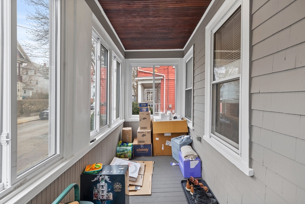 14-16 Malvern Avenue Somerville, MA 02144 - Photo 15 of 39 a living room with furniture and a window
