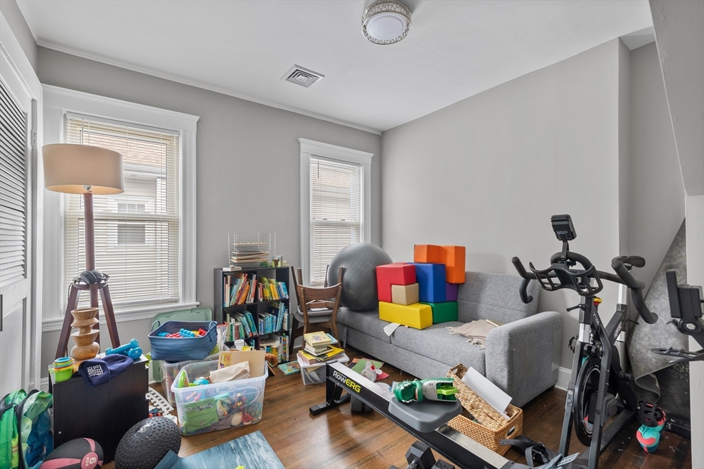 14-16 Malvern Avenue Somerville, MA 02144 - Photo 19 of 39 a living room with furniture and a window