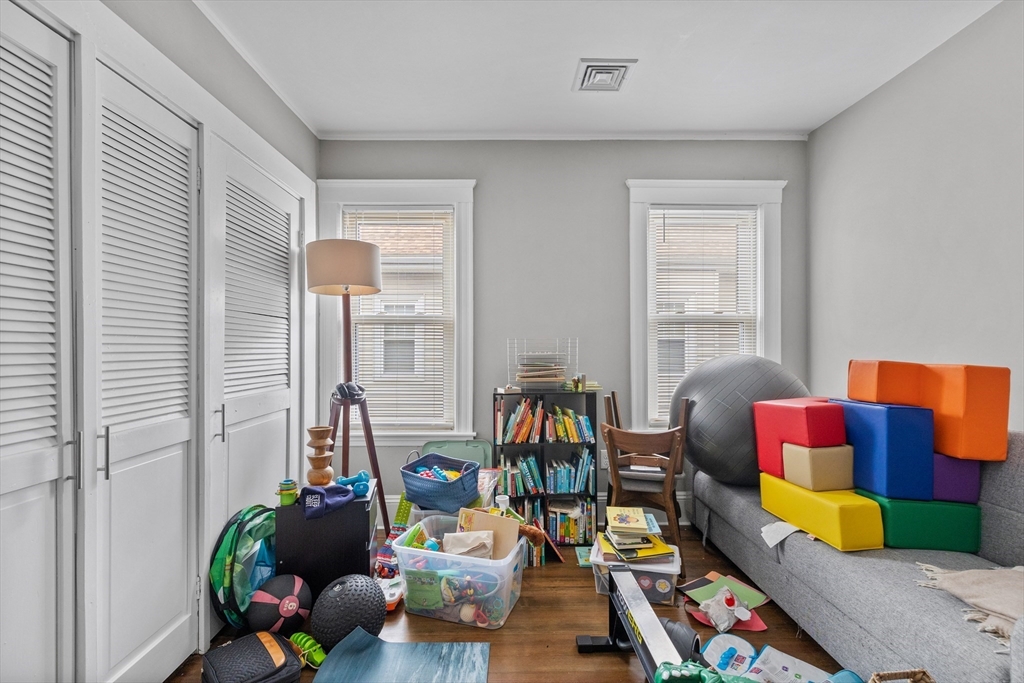 14-16 Malvern Avenue Somerville, MA 02144 - Photo 20 of 39 a living room filled with furniture and a couch