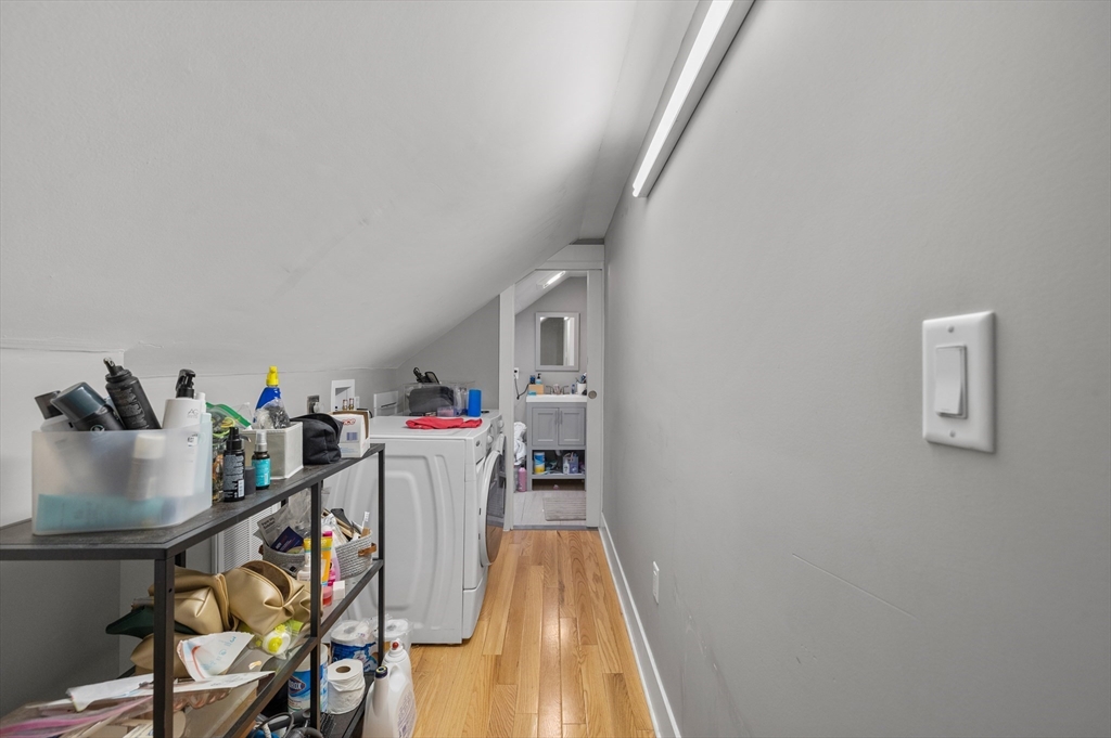 14-16 Malvern Avenue Somerville, MA 02144 - Photo 26 of 39 a workspace with furniture and wooden floor