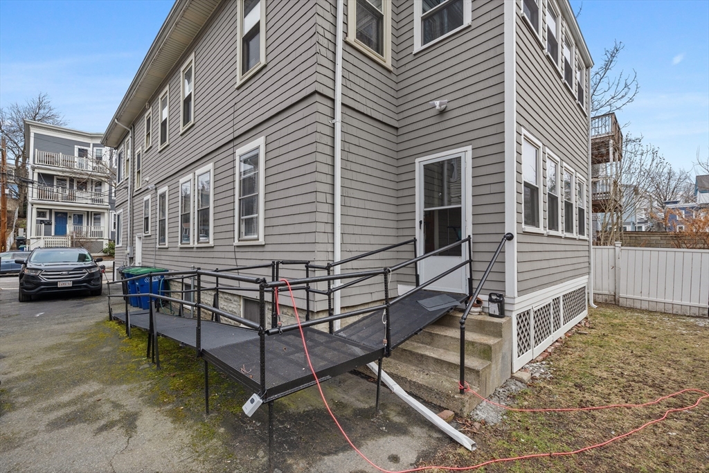 14-16 Malvern Avenue Somerville, MA 02144 - Photo 37 of 39 a view of a house with backyard and sitting area