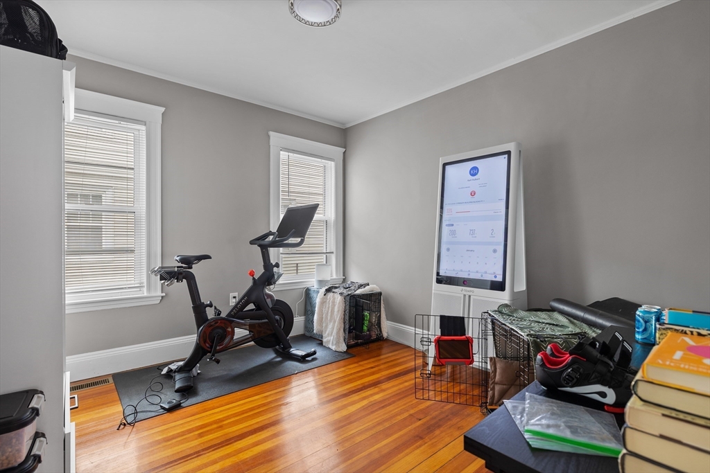 14-16 Malvern Avenue Somerville, MA 02144 - Photo 8 of 39 a view of a workspace with furniture and a window