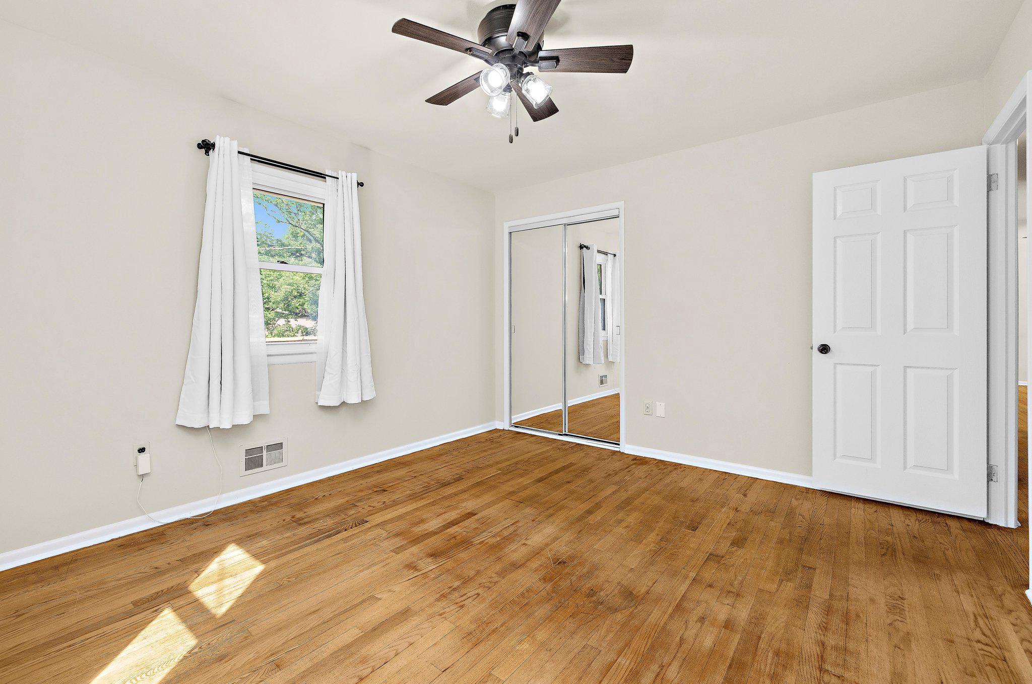 5822 Forest Hill Road Elkridge, MD 21075 - Photo 22 of 55 Comfortable primary bedroom with hardwood floors