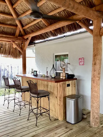 a view of furniture and wooden floor