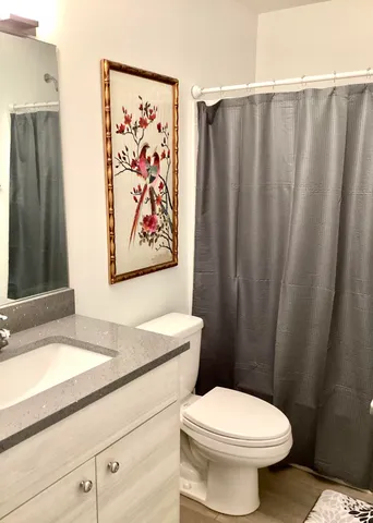a bathroom with a sink and a toilet