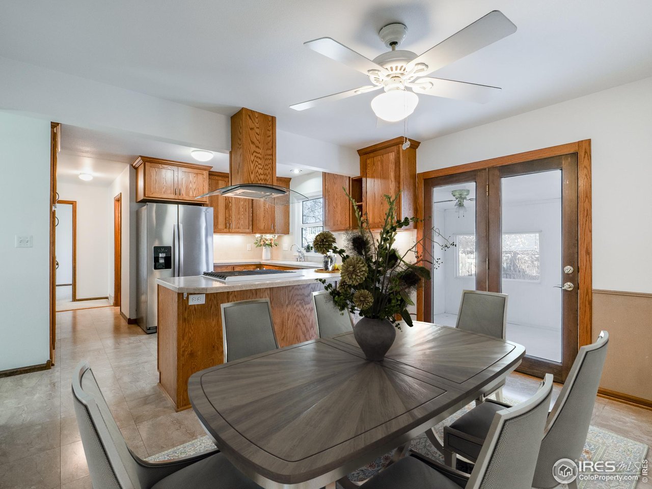 14 Daisy Court Windsor, CO 80550 - Photo 18 of 42 Updated Kitchen with Dining and All Appliances Included Virtually Staged