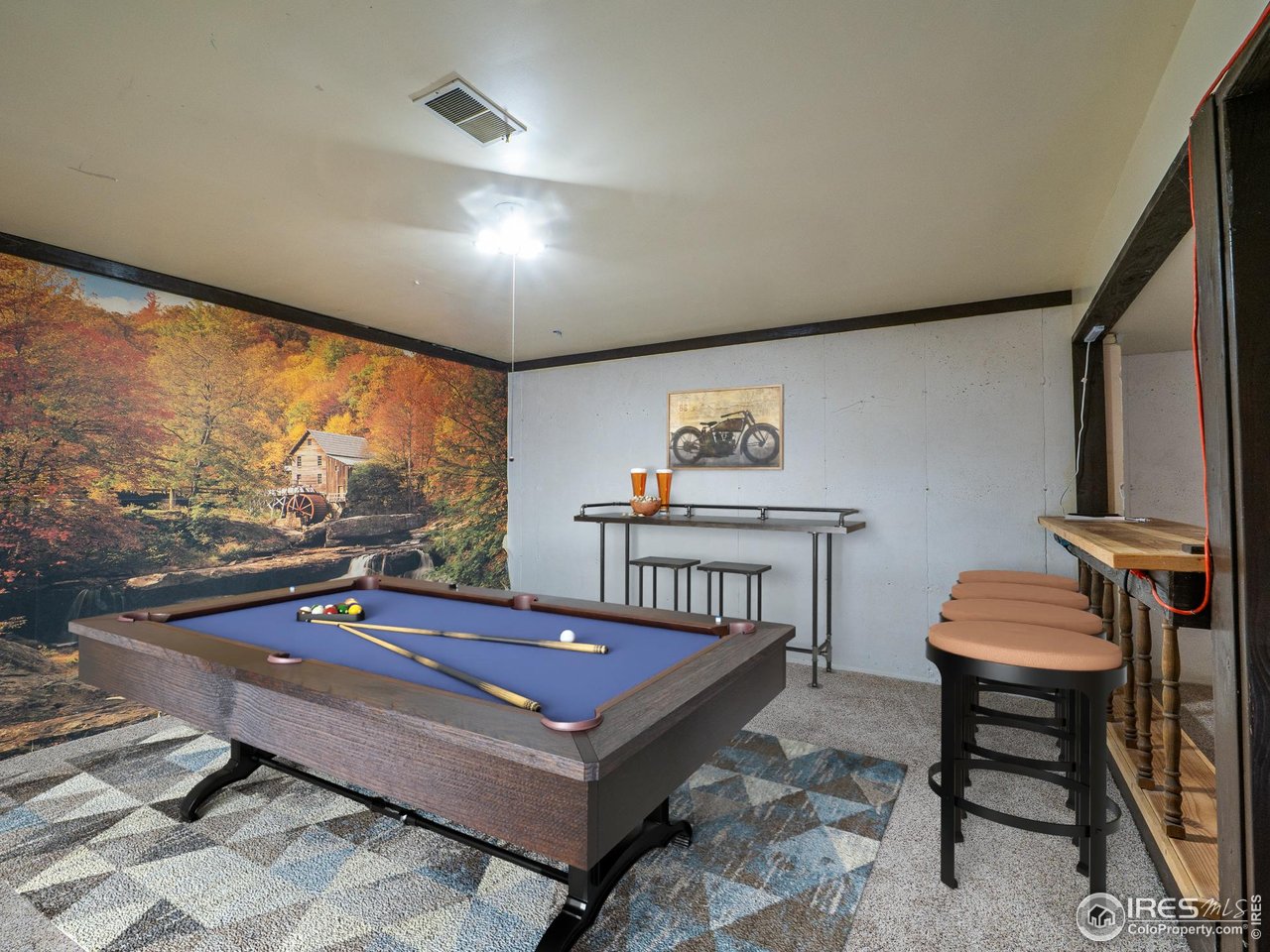 14 Daisy Court Windsor, CO 80550 - Photo 29 of 42 Basement Rec Room Virtually Staged