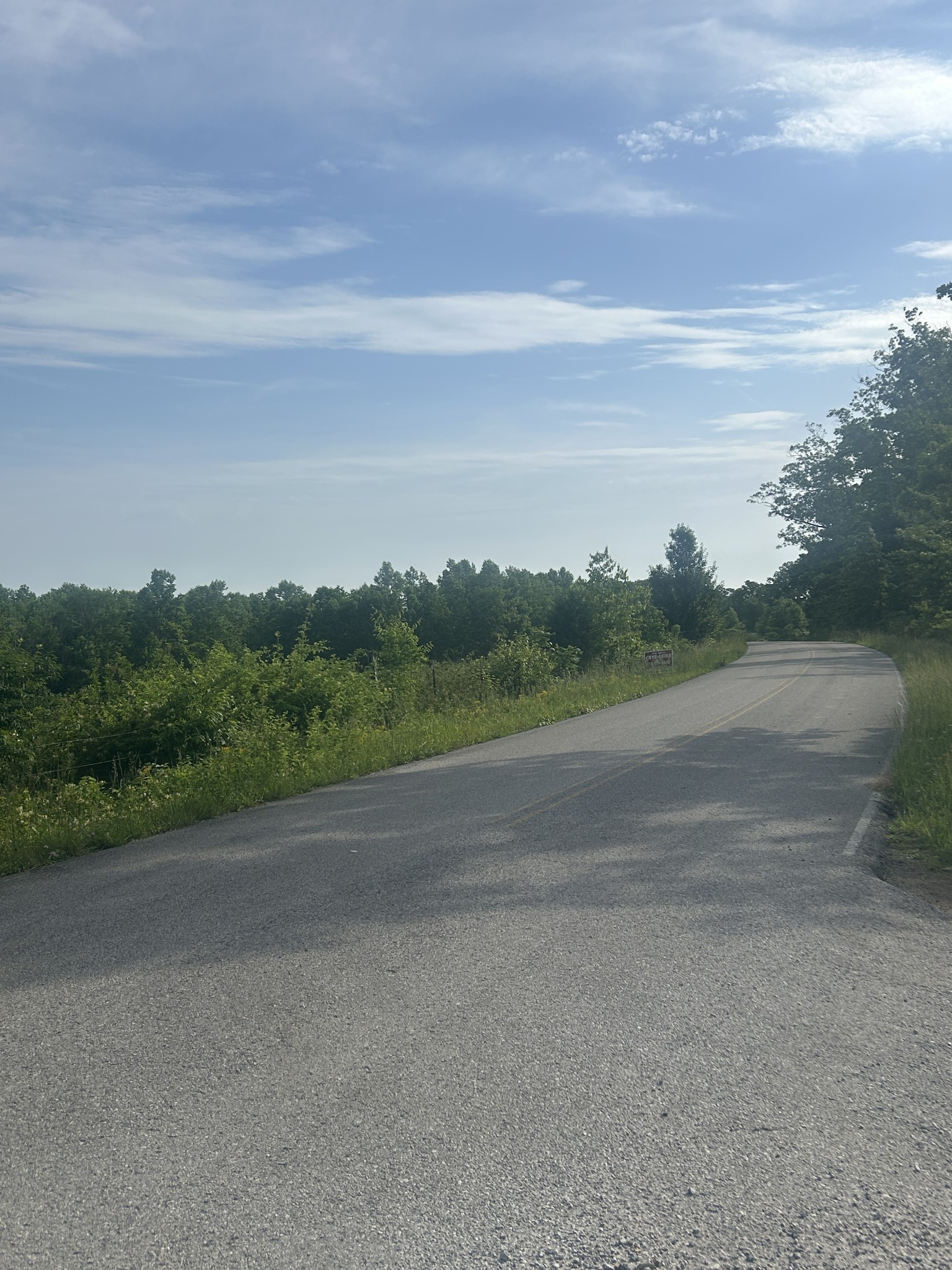 2047 Buffalo Road Hohenwald, TN 38462 - Photo 12 of 25 a view of a field with wooden fence