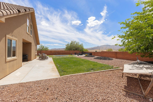 225 Falcon Court Ivins, UT 84738 - Photo 32 of 47 Fenced backyard featuring a mountain view and a patio